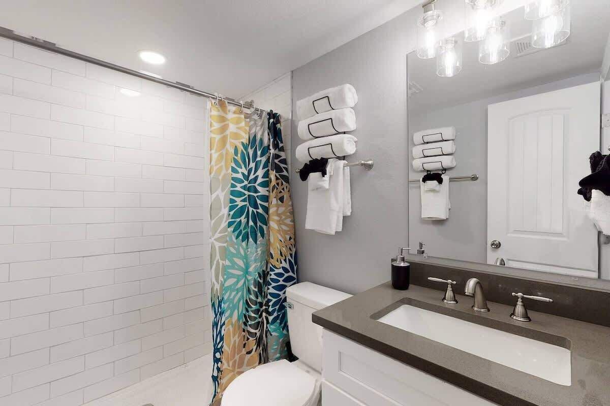 Shower, eco-friendly toiletries, hair dryer, towels