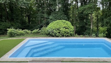 Een verwarmd zwembad