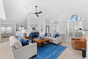 Smart TV, fireplace, books, computer monitors