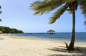 On the beach, sun loungers, beach towels
