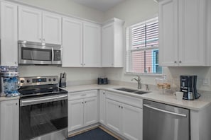 House, Multiple Beds, Hot Tub, Garden View (Get Happy) | Private kitchen | Fridge, microwave, oven, stovetop