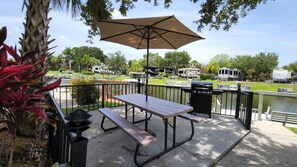 Outdoor dining - Waterfront Luxury RV Lot w/ Private Dock & Grill 430 (River Ranch)
