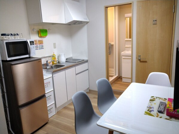 Fridge, microwave, cookware/dishes/utensils