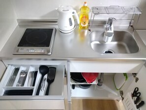 Fridge, microwave, cookware/dishes/utensils
