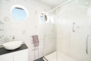 Shower, free toiletries, hair dryer, towels