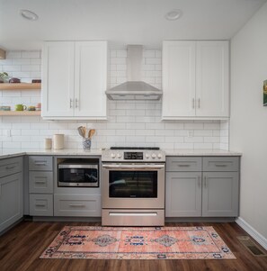 Fridge, microwave, oven, stovetop - Spacious Mid Century Home by the Plaza District (Oklahoma City)
