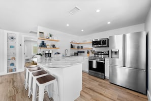 Fridge, microwave, oven, stovetop - Walk to Beach. Beautifully Renovated 3BR, 2BA Home w/Outdoor Shower & Grille (Nokomis)
