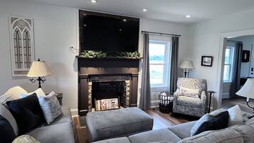 Smart TV, fireplace, books