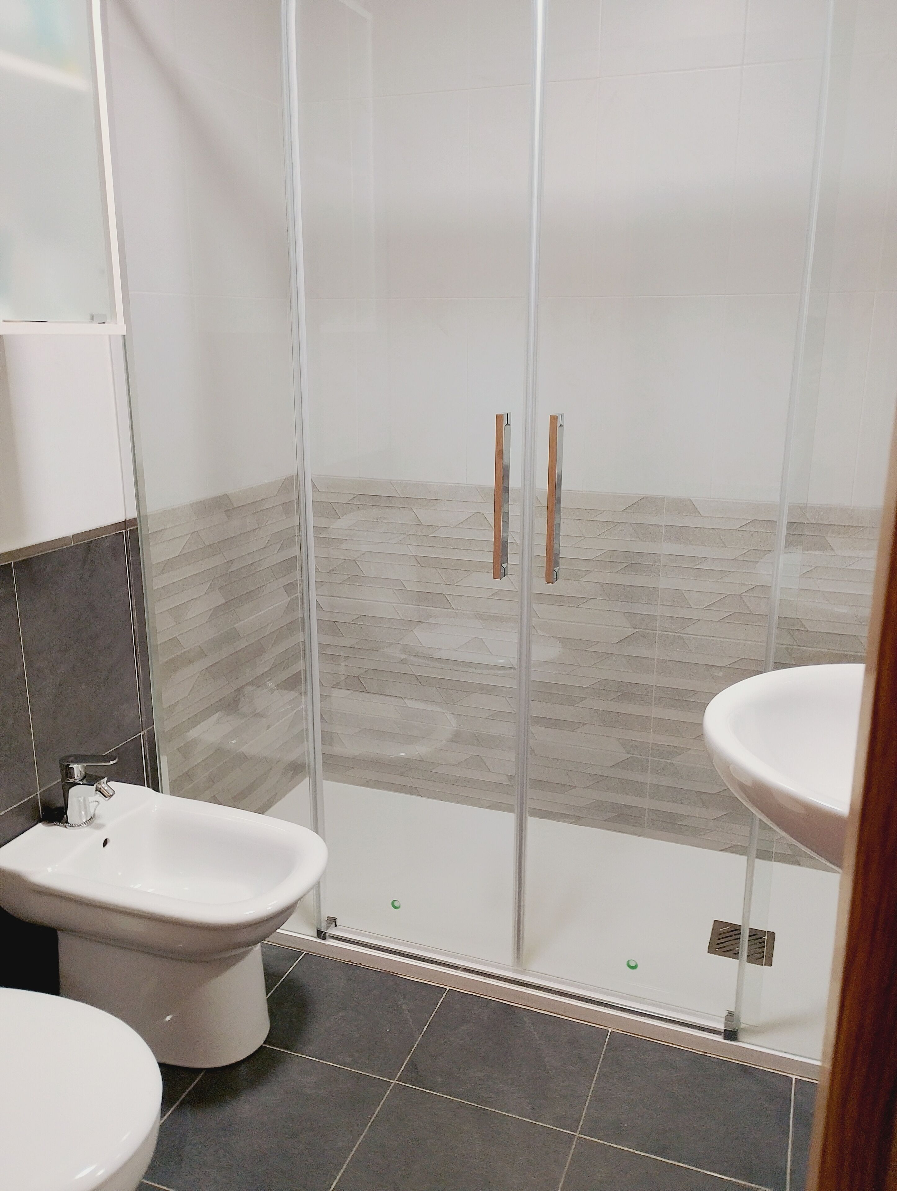 Bathtub, hair dryer, towels, soap