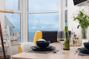 Enjoy a romantic dinner for two in this stylish dining area with a beautiful view.
