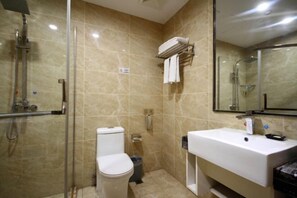 A bathroom with a glass shower enclosure, a toilet, a sink, and a towel rack. - Phoenix Grand Hotel (Xianyang Yangling) (Xianyang)