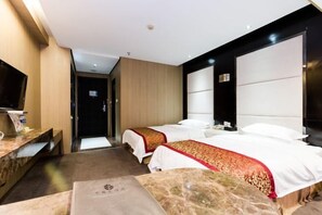 A hotel room with two beds, a TV, a marble table, and a wooden wall. - Boxiyueli Hotel (Wuxi Yuantouzhu Scenic Area) (Wuxi)