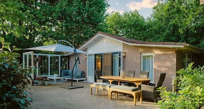 Comfortably furnished holiday home surrounded by trees with plenty of privacy and spacious garden.