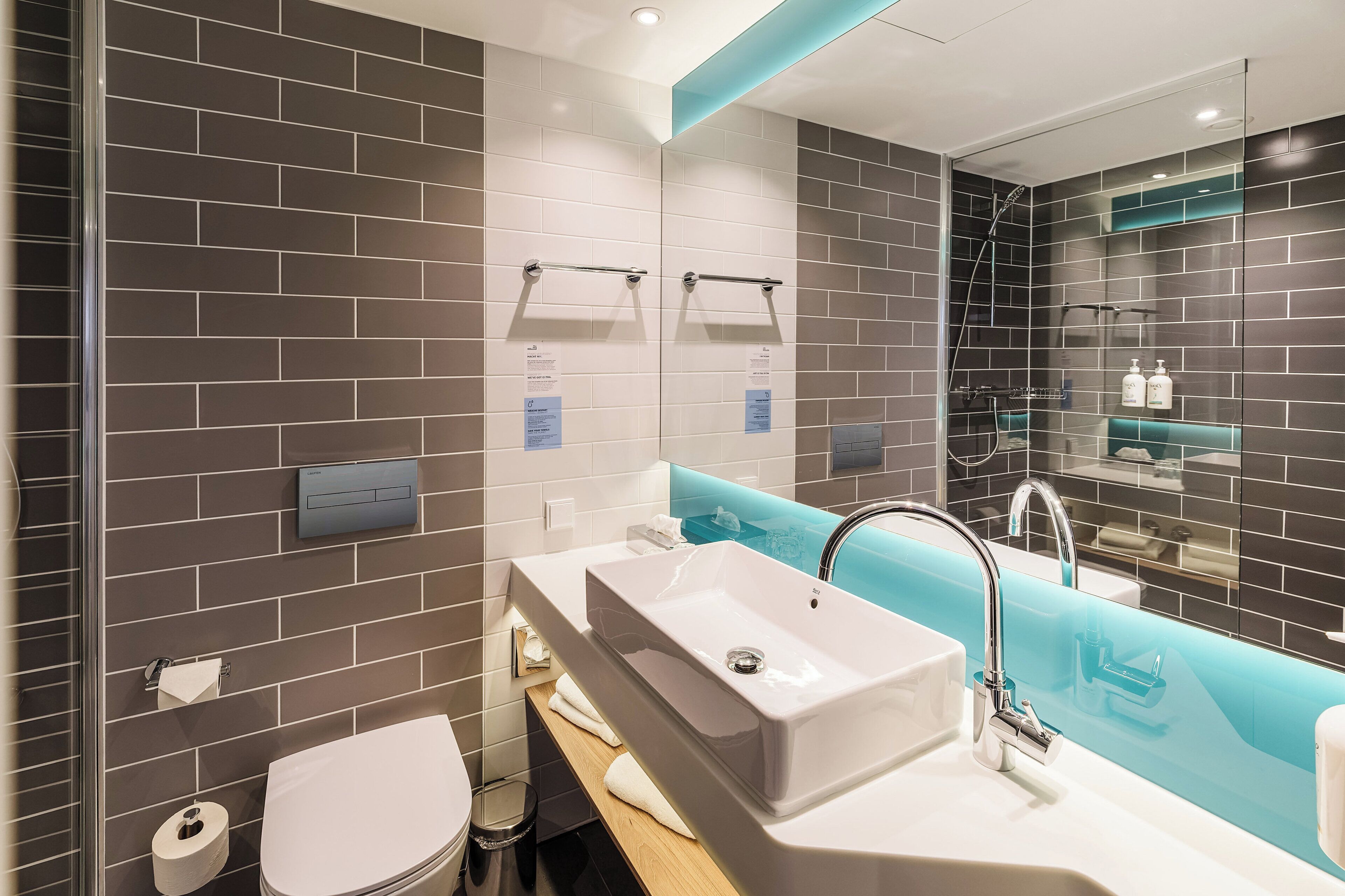 shower, free toiletries, hair dryer, towels