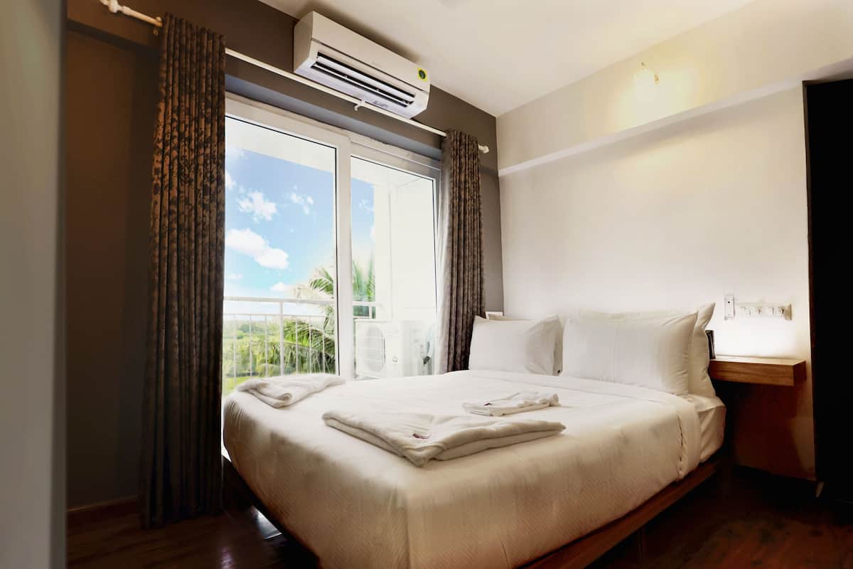 premium room | 1 bedroom, premium bedding, pillow-top beds, in-room safe