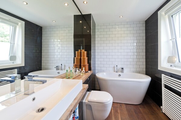 Bathtub, hair dryer, towels