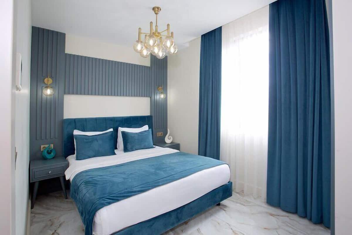 Superior Suite with Two Bedroom | In-room safe, desk, laptop workspace, iron/ironing board