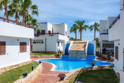 Ferienwohnung La Perla de Cala d'Or 10 mit Gemeinschaftspool, Garten und WLAN