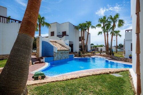 Apartment La Perla de Cala d'Or 10 with Shared Pool, Garden & Wi-Fi
