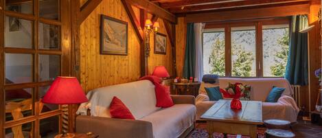 Televisio, takka, DVD-soitin, stereot