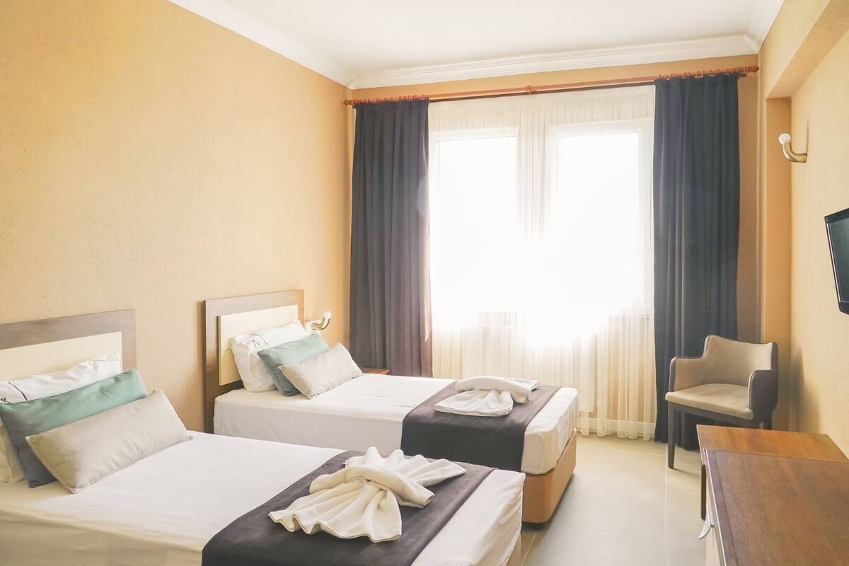 Standard Double or Twin Room | Laptop workspace, blackout drapes, WiFi (free)