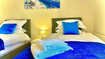 Rumah, Beberapa Tempat Tidur | 3 kamar tidur, setrika/meja setrika, Wi-Fi gratis, dan seprai linen