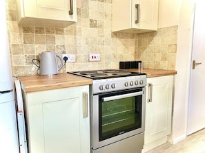 Maison, Plusieurs lits | Cuisine privée | Réfrigérateur, four à micro-ondes, un four, surface de cuisson