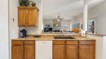 Cabin, Multiple Beds, Patio, Garden View (Bounty of Birdie Lane) | Private kitchen | Coffee/tea maker