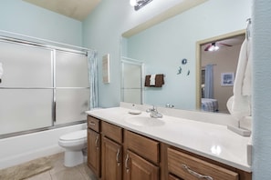 Cabin, Multiple Beds, Patio, Garden View (Bounty of Birdie Lane) | Bathroom | Towels, shampoo, toilet paper