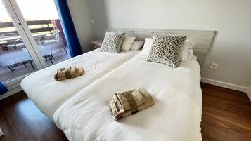 2 habitaciones, tabla de planchar con plancha, wifi y ropa de cama