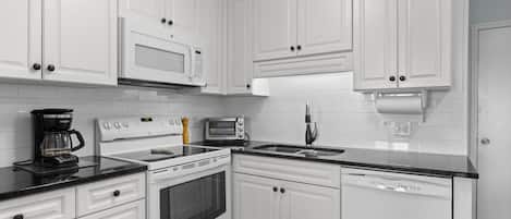 Dishwasher, coffee/tea maker, cookware/dishes/utensils