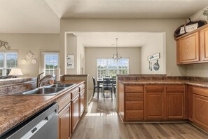 Townhome, Multiple Beds, Balcony, Garden View (Birdie Lane Beauty) | Private kitchen | Coffee/tea maker, dining tables