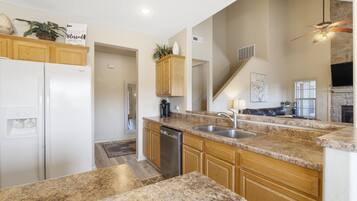 Townhome, Multiple Beds, Balcony, Garden View (Birdie Lane Beauty) | Private kitchen | Coffee/tea maker, dining tables