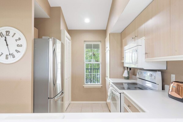 Condo, Multiple Beds, Kitchen, Garden View (Cityscape Memories) | Private kitchen | Coffee/tea maker