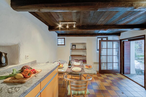 Family Chalet, 1 Bedroom, Mountainside (Rustico Caterina) | Private kitchenette | Fridge, oven, stovetop, coffee/tea maker