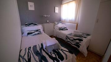 1 dormitorio y ropa de cama