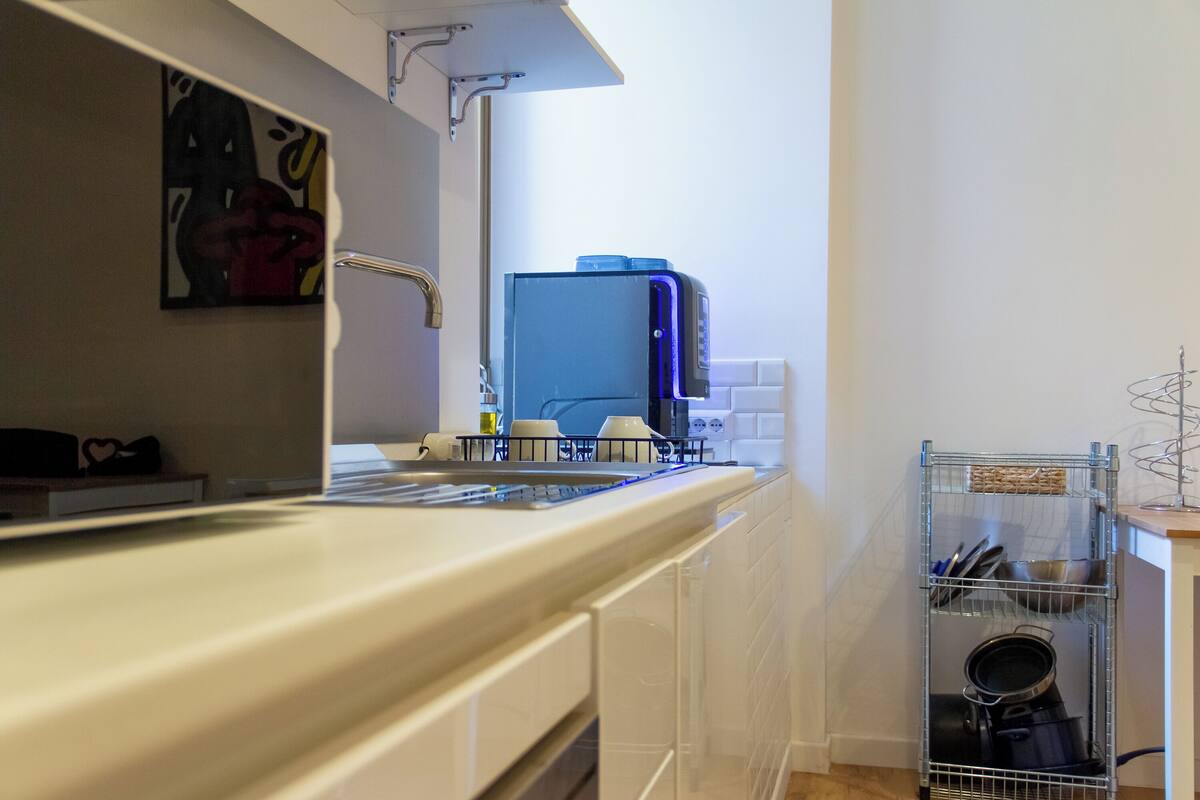 Espresso maker, coffee/tea maker, fridge, microwave