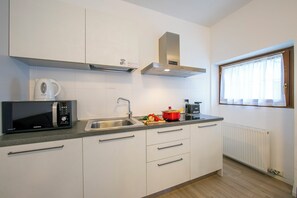 Family Apartment, 2 Bedrooms (Arco Rocks 2) | Private kitchen | Fridge, microwave, stovetop, dishwasher