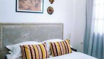 1 bedroom, desk, iron/ironing board, bed sheets