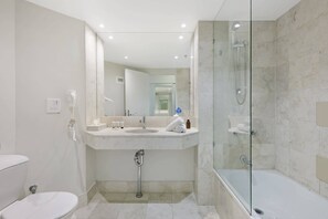 Bathtub, hair dryer, towels