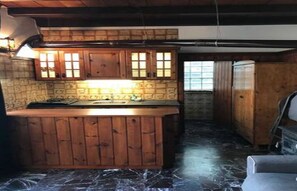 Fridge, coffee/tea maker, electric kettle, cookware/dishes/utensils