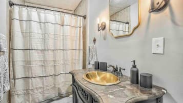 Bathtub, hair dryer, towels