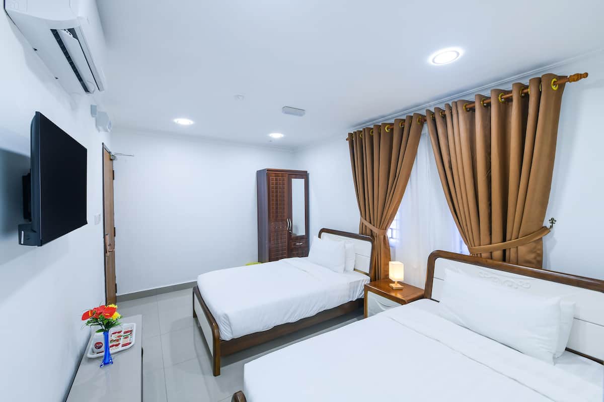 ห้องดีลักซ์ทวิน | โต๊ะทำงาน, Wi-Fi ฟรี, ผ้าปูที่นอน