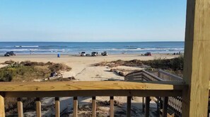 On the beach, sun-loungers