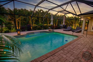Outdoor pool, a heated pool - Spectacular Heat Pump Pool/Lanai, 4 bed/2 Bath Home  only 10 min from 5 beaches (Rotonda West)