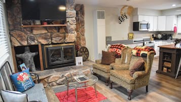 Téléviseur à écran plat, foyer