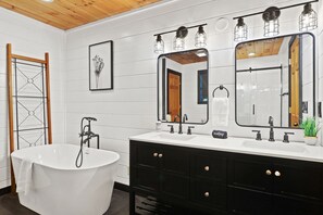 Bathtub, hair dryer, towels, soap