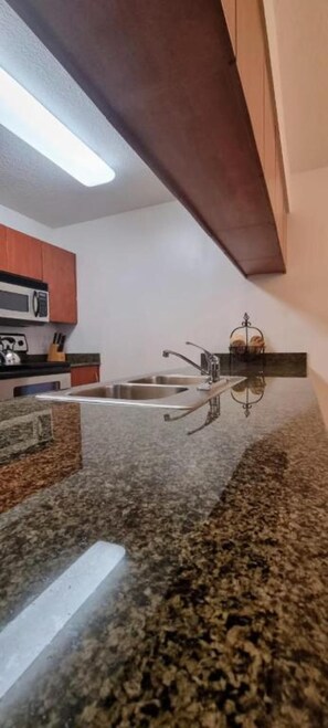 Fridge, stovetop, dishwasher, blender