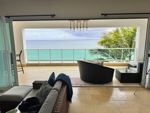 Smart TV, books, stereo - Beachfront Luxury Penthouse • 2 Levels • 4BR/3BA • Pools + Ocean Views (Sosúa)