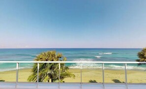 On the beach, sun-loungers - Beachfront Luxury Penthouse • 2 Levels • 4BR/3BA • Pools + Ocean Views (Sosúa)